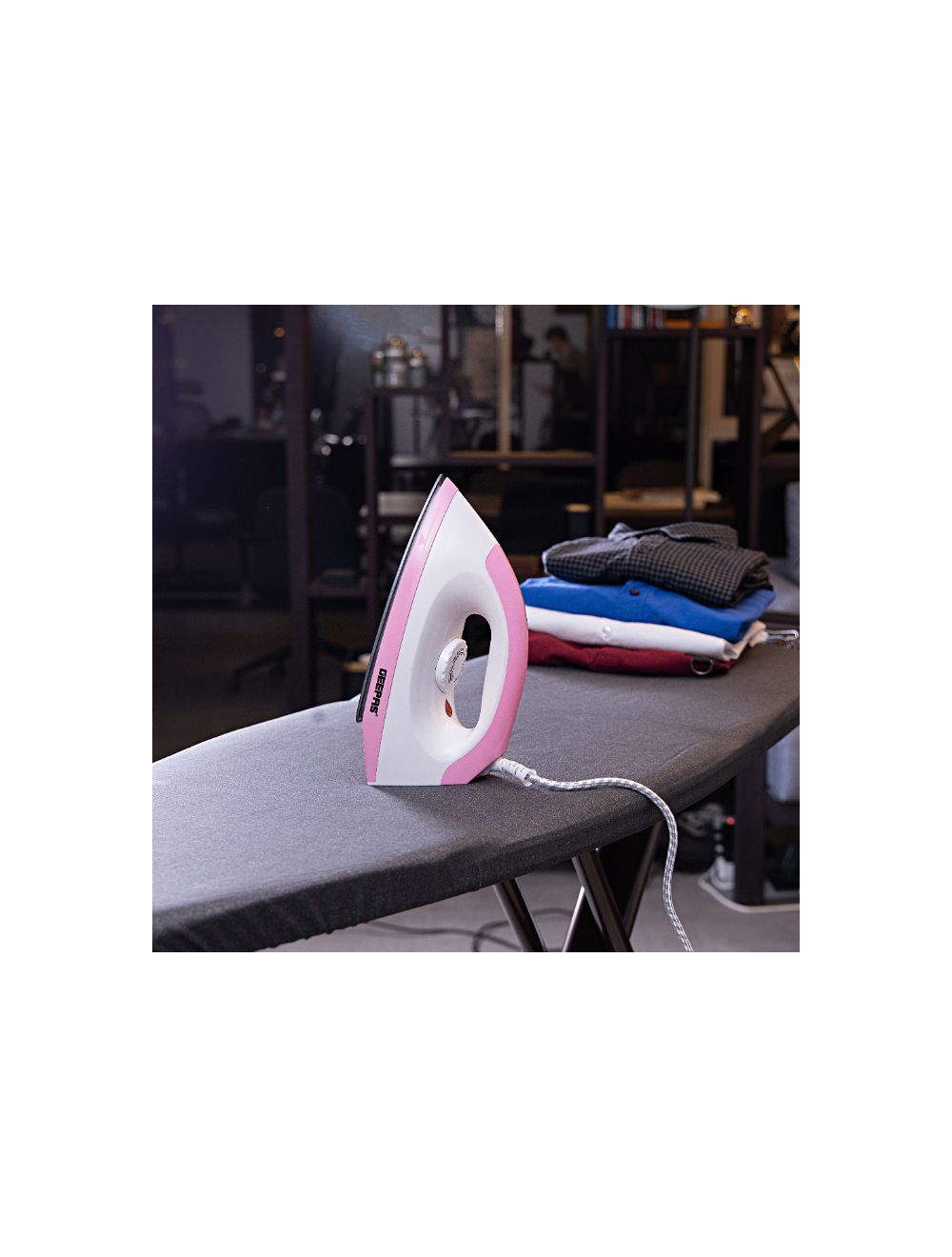 Geepas 1200W Dry Iron | reliable performance | lightweight | variable steam settings | safety features | stylish | even heat distribution | Halabh.com