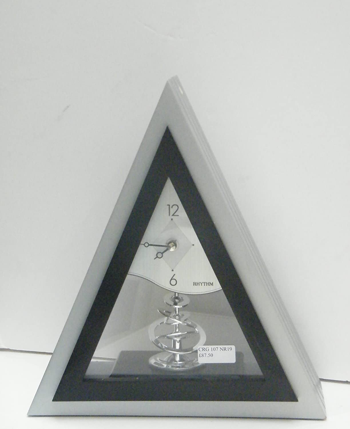 Rhythm Quartz Mantel Clock Silver Case with revolving pendulum